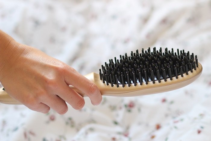 brosse chauffante lissante cheveux